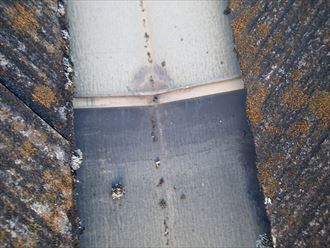 足立区　谷板金雨水排水不良